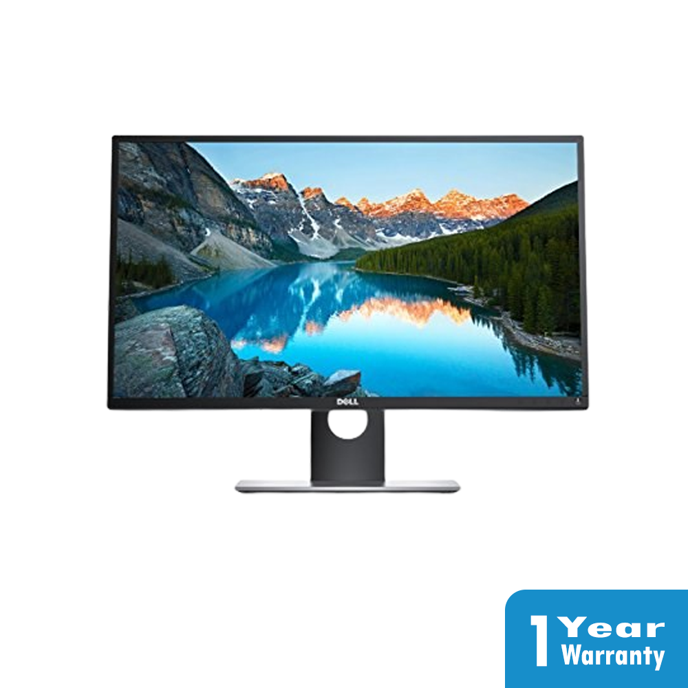 a computer monitor with a lake and mountains