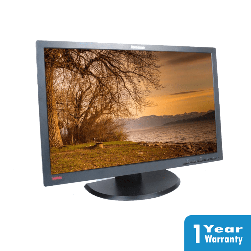 a computer monitor with a landscape on the screen